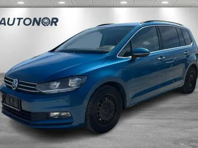 Begagnad VW Touran Comfortline 150 HK (110 kW) 2016 Blå Minibuss