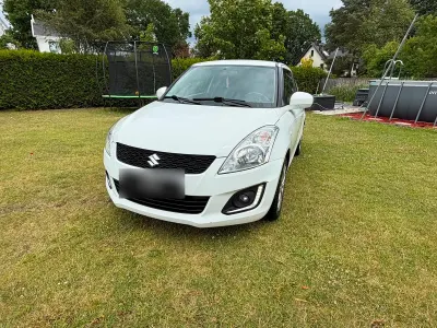 Gebraucht Suzuki Swift 94 PS (69 kW) 2015 Weiß Kleinwagen