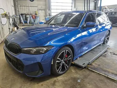 Gebraucht BMW 320 M Sport 190 PS (139 kW) 2023 M portimao blau Kombi