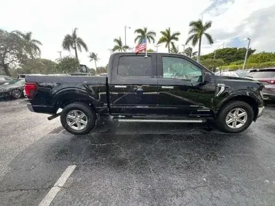 Gebraucht Ford F-150 XLT 436 PS (320 kW) 2024 Schwarz Pickup
