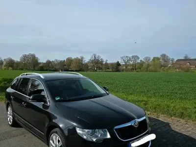 Używany Skoda Superb Elegance 170 KM (125 kW) 2012 Czarny Kombi