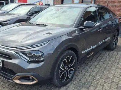 Gebraucht Citroën e-C4 100 kW (136 PS) 2023 Platiniumgrau met. Limousine