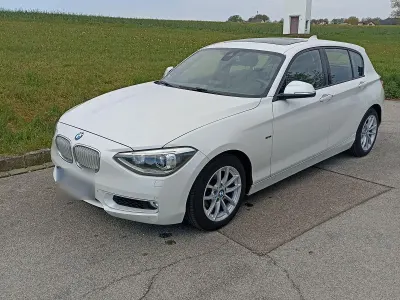 Używany BMW 116 Urban Line 136 KM (100 kW) 2012 Biały Hatchback