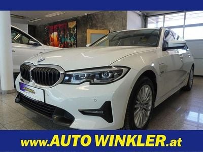 Second-hand BMW 320e Sport Line 204 CP (150 kW) 2022 Alb Break