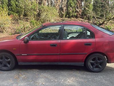Usata Mitsubishi Carisma 90 CV (66 kW) 1996 Rosso Berlina