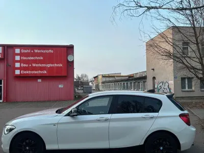 Second-hand BMW 116 Sport Line 136 CP (100 kW) 2014 Negru Hatchback