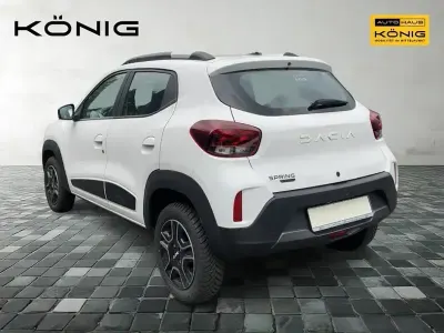 Gebraucht Dacia Spring Essentiel 47 kW (65 PS) 2023 Kaolinweiß Kleinwagen