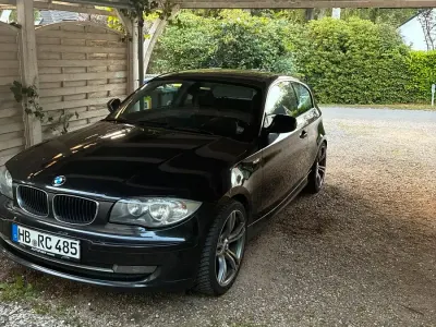 Gebraucht BMW 116 115 PS (84 kW) 2010 Schwarz Kleinwagen