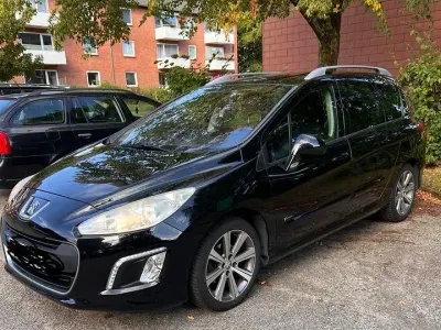 Gebraucht Peugeot 308 SW 112 PS (82 kW) 2012 Schwarz Kombi