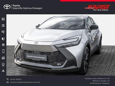 Shimmering silver metallic / dach schwarz Gebraucht 2023 Toyota C-HR Team SUV | 30.490 € (Etwas zu teuer)