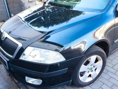 Używany Skoda Octavia 101 KM (74 kW) 2004 Czarny Kombi