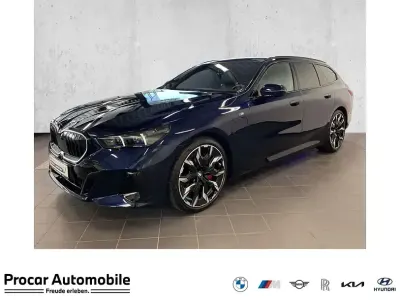 Second-hand BMW 550e M Sport 313 CP (230 kW) 2025 Albastru Break