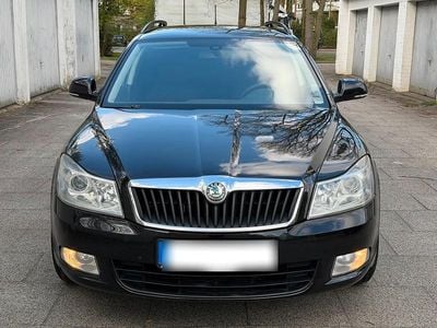 Second-hand Skoda Octavia Elegance 105 CP (77 kW) 2013 Negru Break