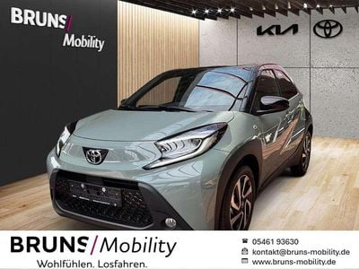 Gebraucht Toyota Aygo X Pulse 72 PS (52 kW) 2025 Urban khaki / schwarz SUV