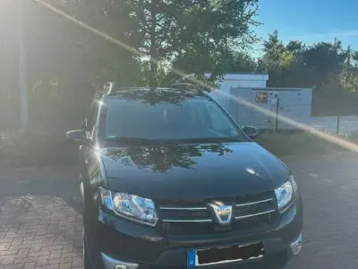 Używany Dacia Sandero Prestige 90 KM (66 kW) 2014 Czarny Sedan/Limuzyna