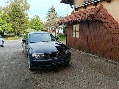 Second-hand BMW 116 122 CP (89 kW) 2011 Negru Hatchback