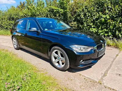 Gebraucht BMW 320 184 PS (135 kW) 2012 Schwarz Kombi
