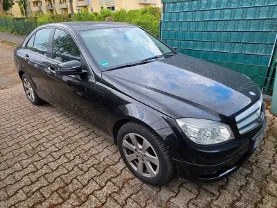 Second-hand Mercedes C200 136 CP (100 kW) 2009 Negru Berlinǎ
