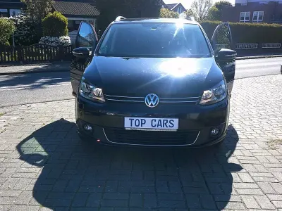 Second-hand VW Touran Cup 105 CP (77 kW) 2014 Negru Monovolum