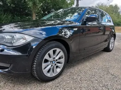 Usata BMW 120 177 CV (130 kW) 2011 Nero Utilitaria