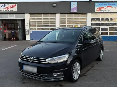Używany VW Touran 190 KM (139 kW) 2016 Czarny Minivan