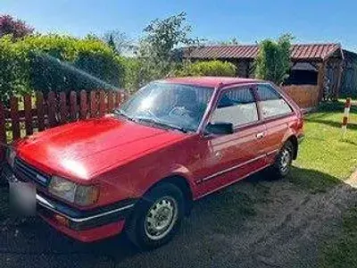 Gebraucht Mazda 323 60 PS (44 kW) 1985 Rot Kleinwagen