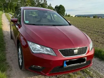 Używany Seat Leon Style 150 KM (110 kW) 2014 Czerwony Sedan/Limuzyna