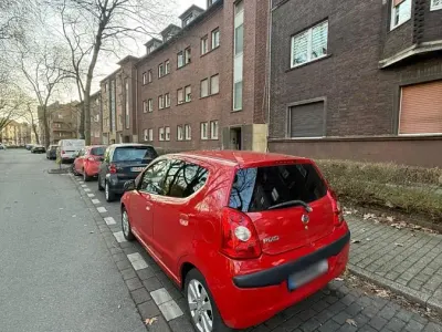 Gebraucht Nissan Pixo 68 PS (50 kW) 2012 Rot Kleinwagen