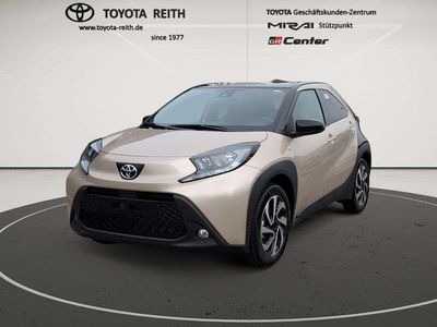 Neu Toyota Aygo X 72 PS (52 kW) 2025 Ginger beige (4u9)/ black mica SUV