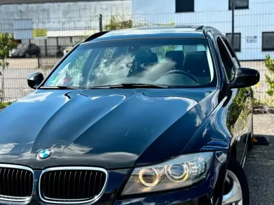 Gebraucht BMW 320 163 PS (119 kW) 2011 Schwarz Kombi