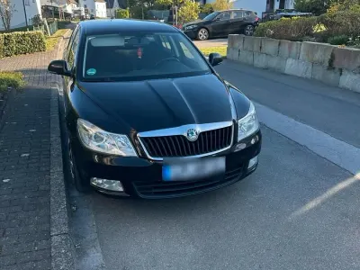 Używany Skoda Octavia 105 KM (77 kW) 2010 Czarny Kombi