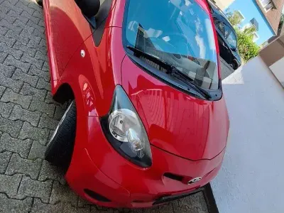 Gebraucht Toyota Aygo 68 PS (50 kW) 2009 Rot Kleinwagen