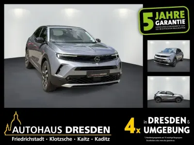 Usado Opel Mokka-e Elegance 100 kW (136 HP) 2022 Cinzento SUV
