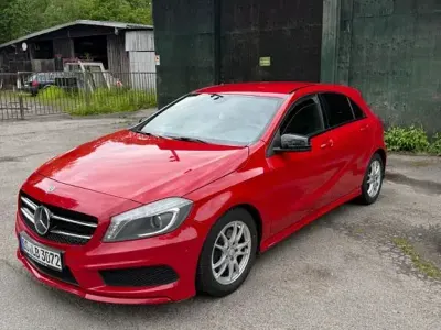 Używany Mercedes A180 Sport 122 KM (89 kW) 2013 Czerwony Sedan/Limuzyna