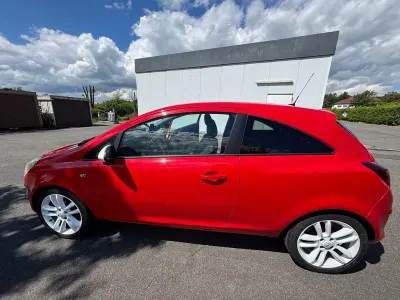 Gebraucht Opel Corsa 101 PS (74 kW) 2012 Rot Kleinwagen