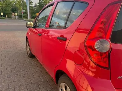 Gebraucht Opel Agila 68 PS (50 kW) 2010 Rot Kleinwagen