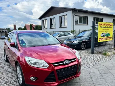 Gebraucht Ford Focus Titanium 150 PS (110 kW) 2012 Candyrot metallic Kombi
