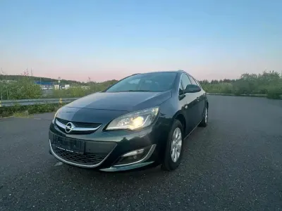Gebraucht Opel Astra 110 PS (80 kW) 2016 Grün Kombi