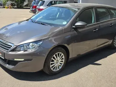 Gebraucht Peugeot 308 SW Access 131 PS (96 kW) 2015 Braun Kombi