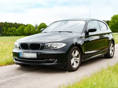 Gebraucht BMW 116 122 PS (89 kW) 2011 Schwarz Kleinwagen