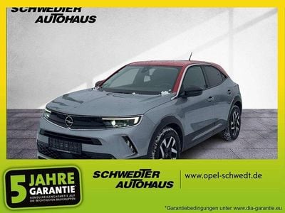 Gebraucht Opel Mokka Elegance 101 PS (74 kW) 2021 Kontrast grau/quarz silber SUV
