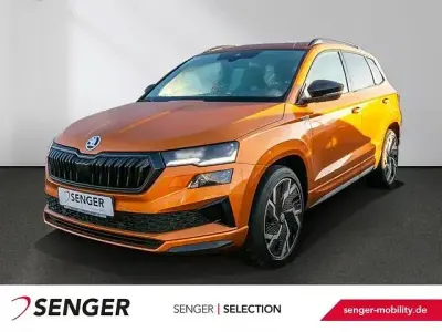 Gebraucht Skoda Karoq SportLine 190 PS (139 kW) 2022 Phoenixorange premium meta... SUV
