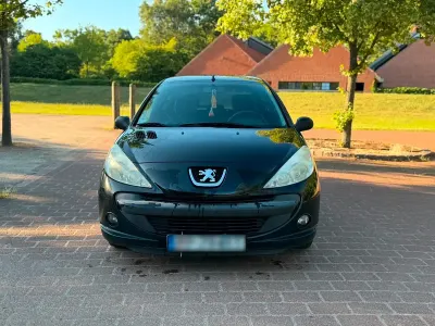 Gebraucht Peugeot 206+ 90 PS (66 kW) 2011 Schwarz Kleinwagen