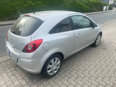 Używany Opel Corsa Selection 69 KM (50 kW) 2010 Srebrny Hatchback