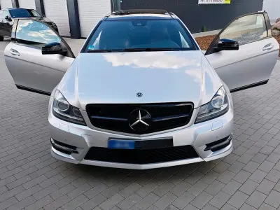 Gebraucht Mercedes C180 AMG 156 PS (114 kW) 2015 Silber Coupé