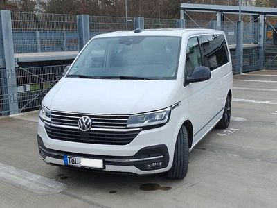 Second-hand VW Multivan Generation Six 204 CP (150 kW) 2021 Alb Monovolum
