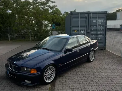 Gebraucht BMW 318 Basis 115 PS (84 kW) 1994 Blau Limousine