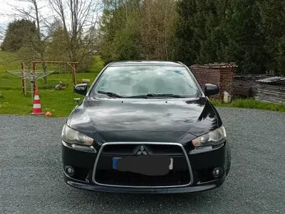 Gebraucht Mitsubishi Lancer Inform 143 PS (105 kW) 2010 Schwarz Limousine