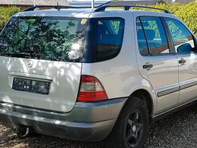Brugt Mercedes ML320 218 HK (160 kW) 1999 Sølv SUV