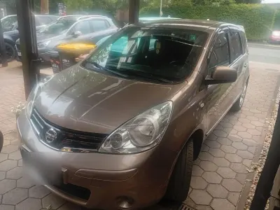 Gebraucht Nissan Note I-Way 88 PS (64 kW) 2010 Gold Kleinwagen